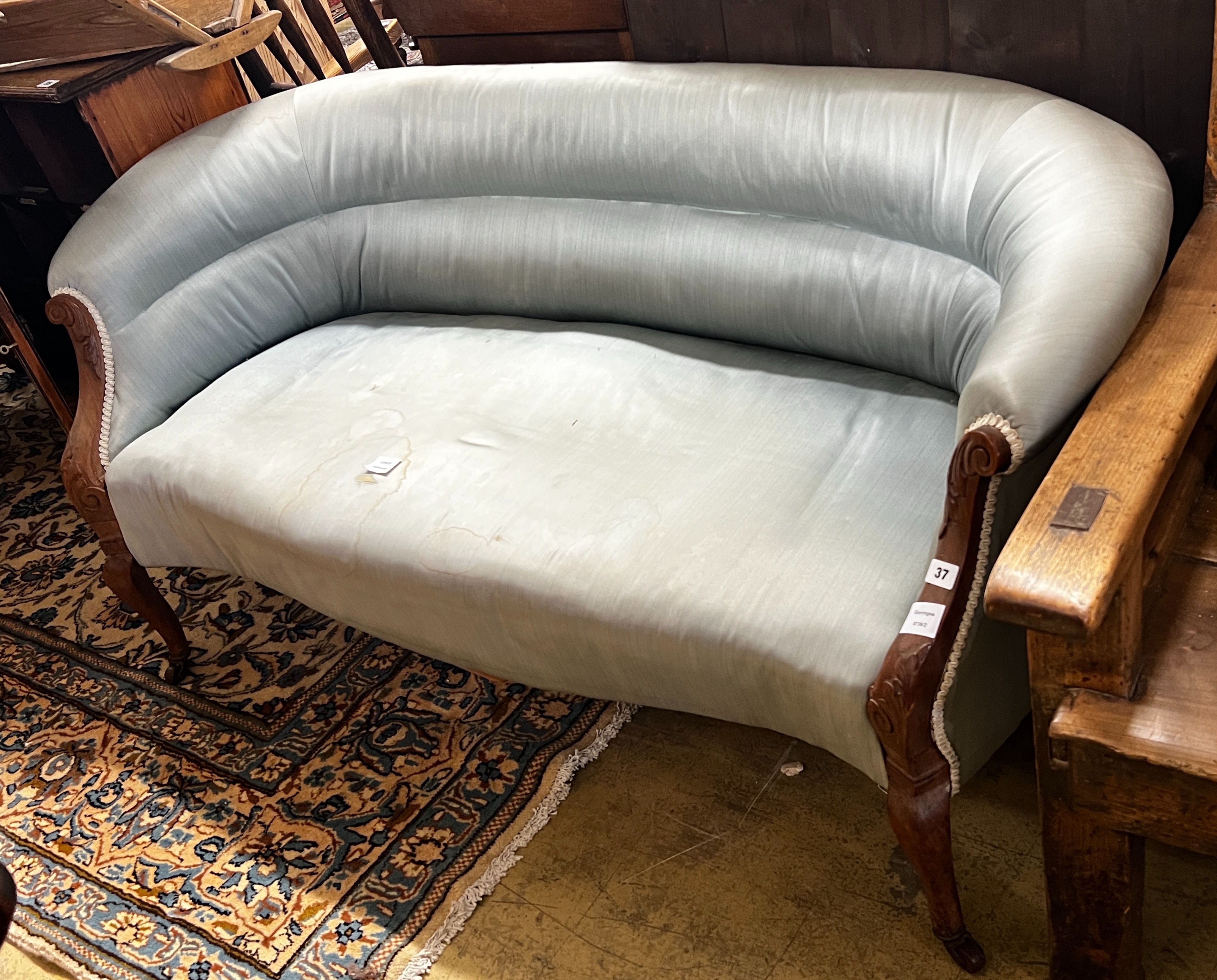 An Edwardian upholstered tub framed settee, length 148cm, depth 68cm, height 70cm